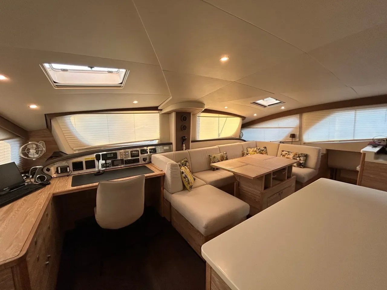 Main salon and island galley aboard Stella Blue luxury catamaran